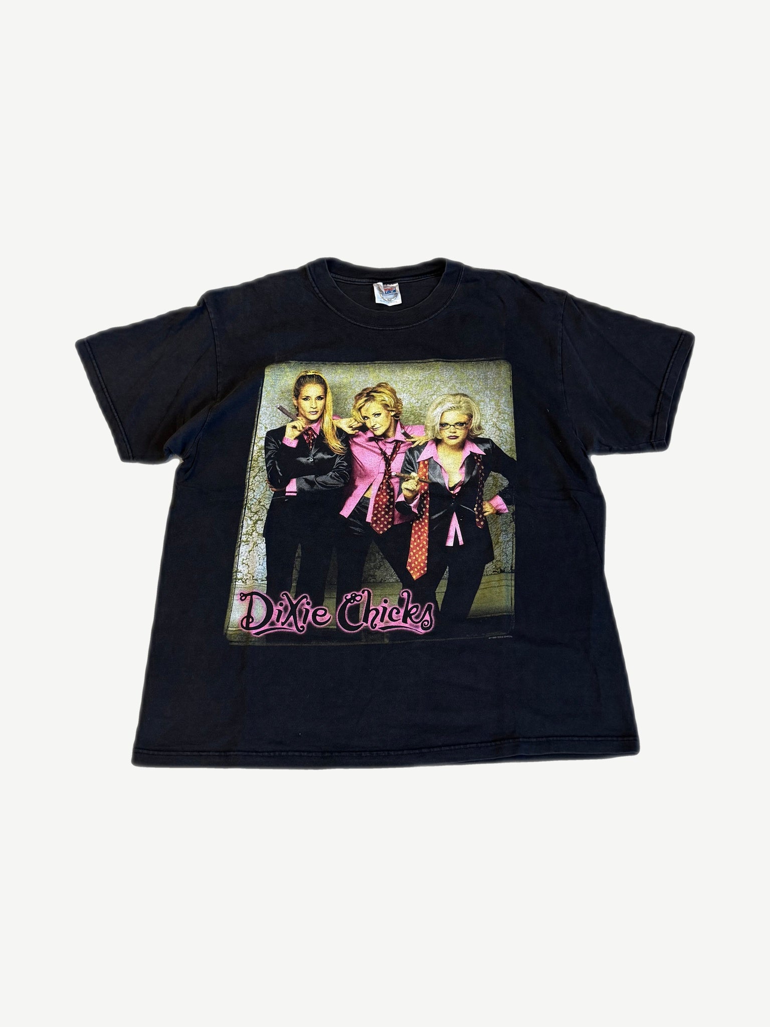 Vintage Dixie Chicks black tee with band photo in pink suits and signature pink cursive Dixie Chicks logo, front