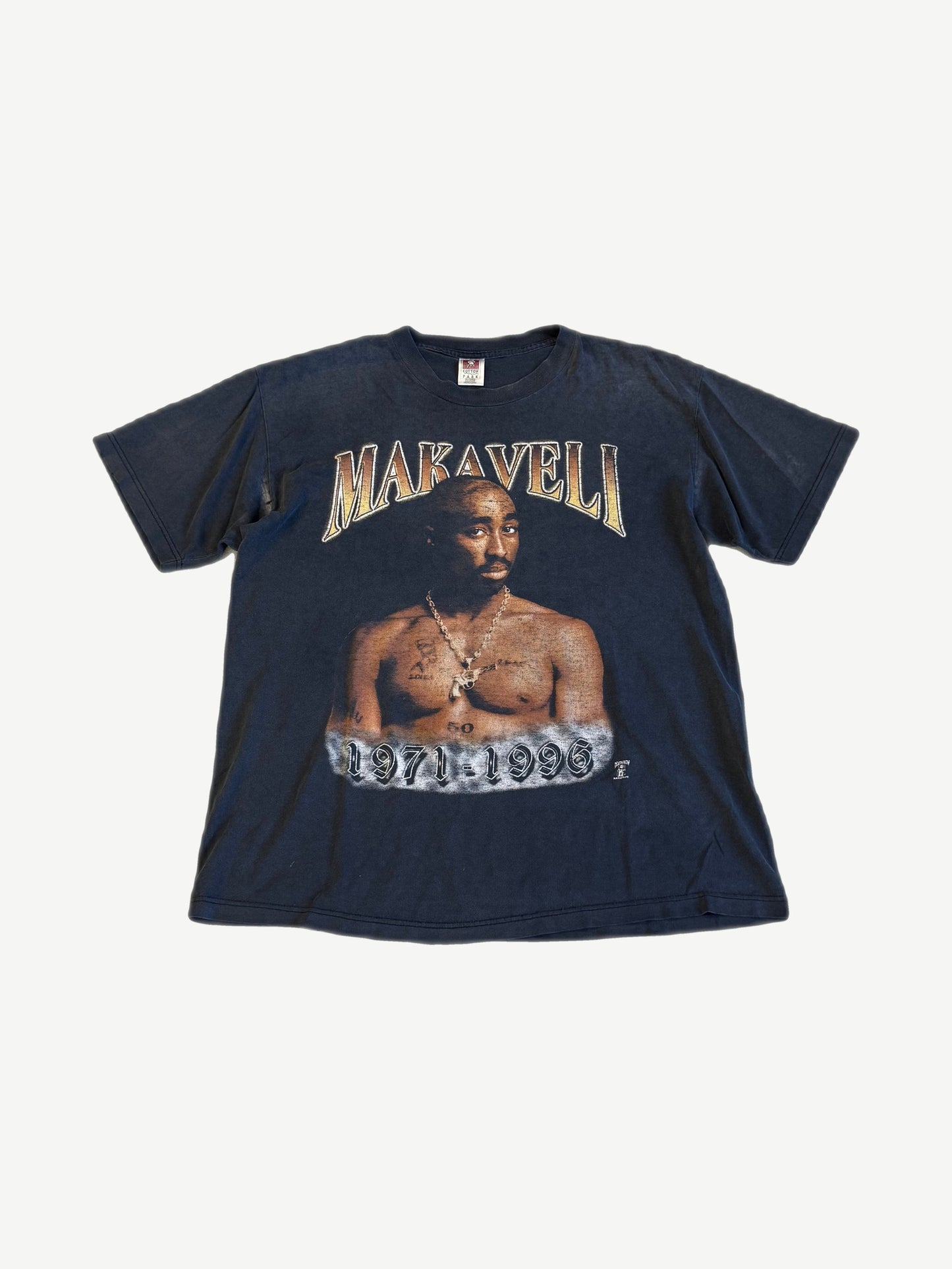 Vintage Tupac Makaveli faded black memorial tee front with portrait and 1971 to 1996 gothic dates