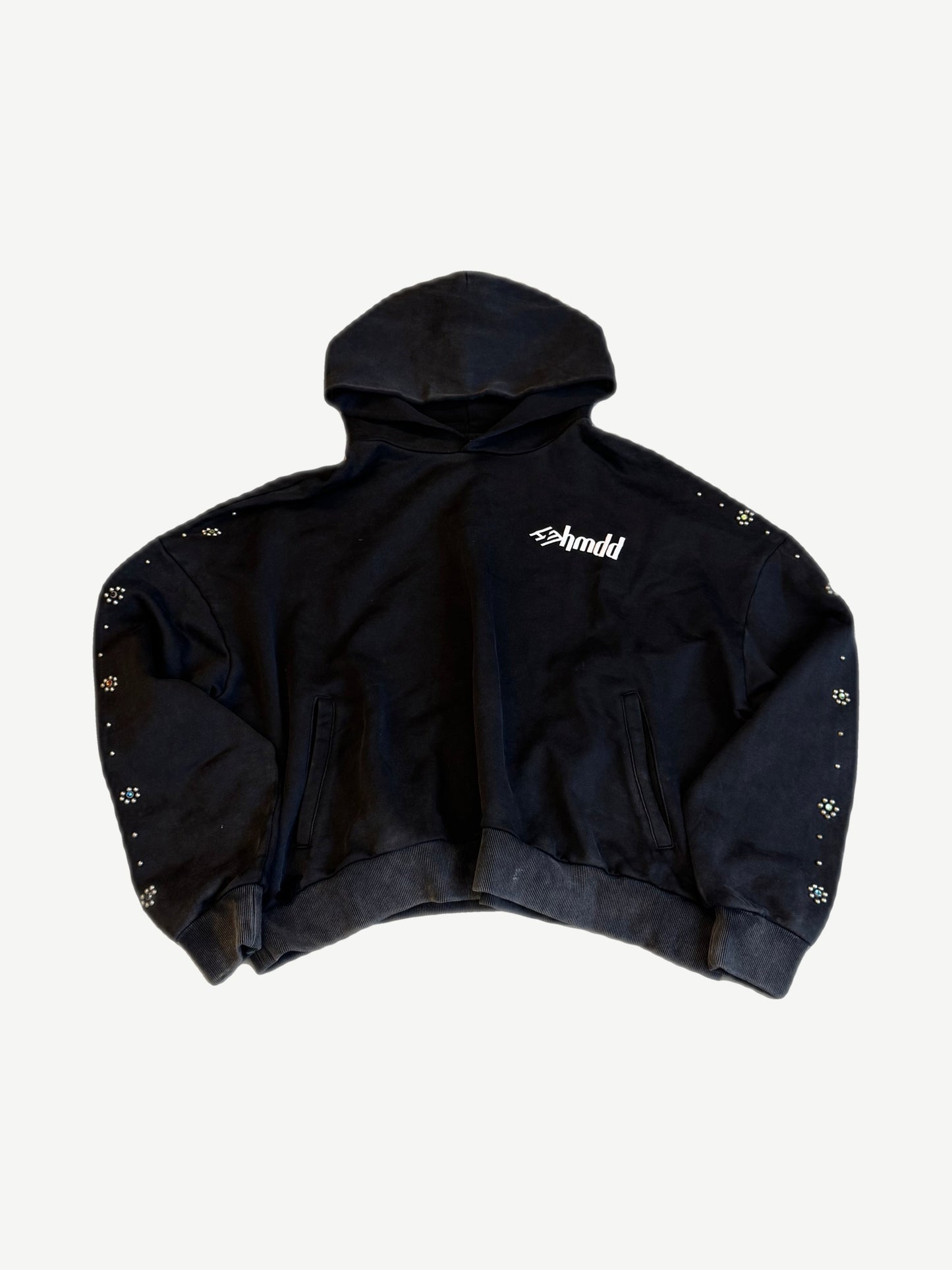 HMDD Flower Studded hoodie in black with rhinestone floral clusters along sleeves and white chest logo.