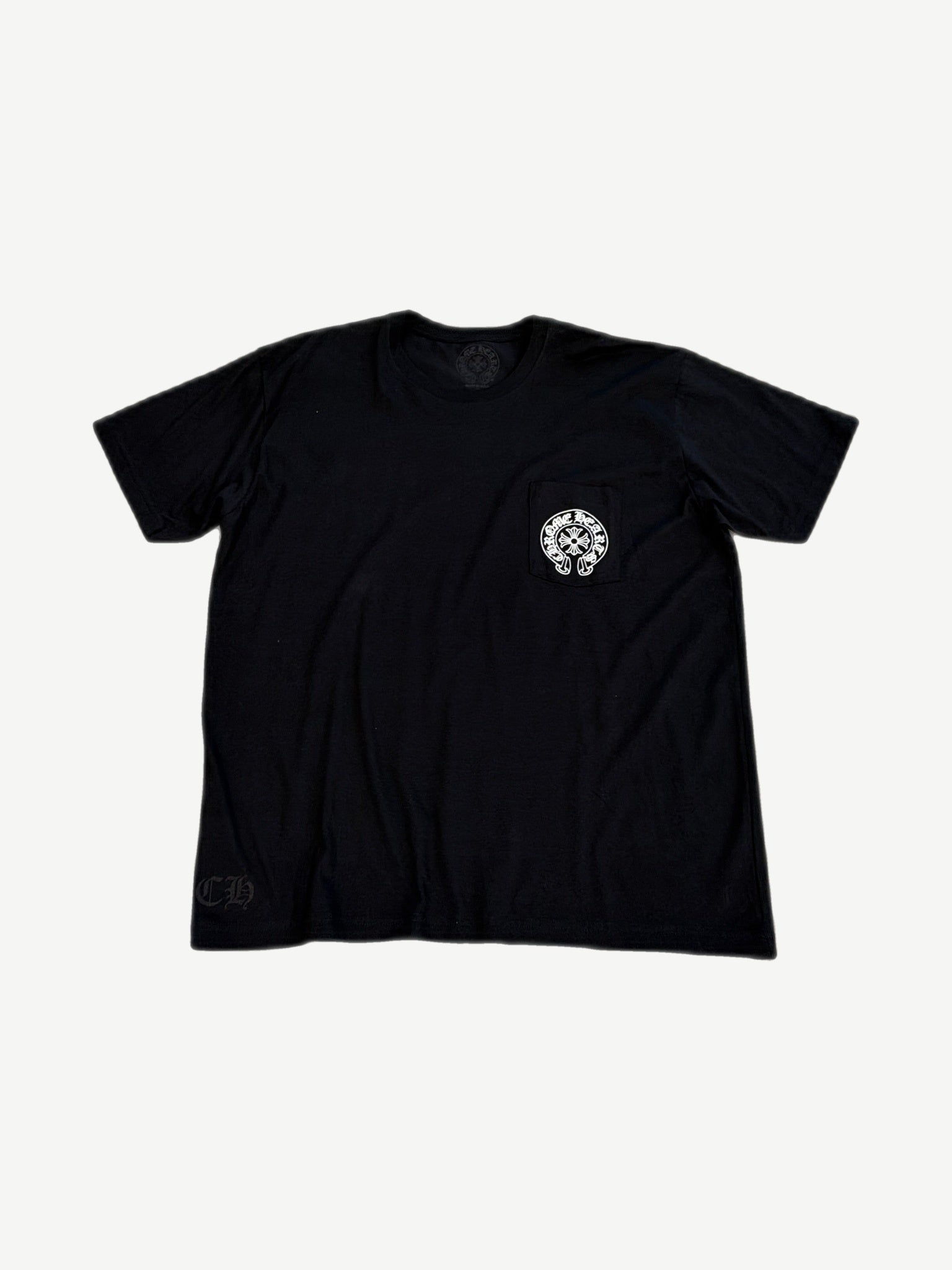 Chrome Hearts black Las Vegas pocket tee front with horseshoe cross chest print and gothic CH hem