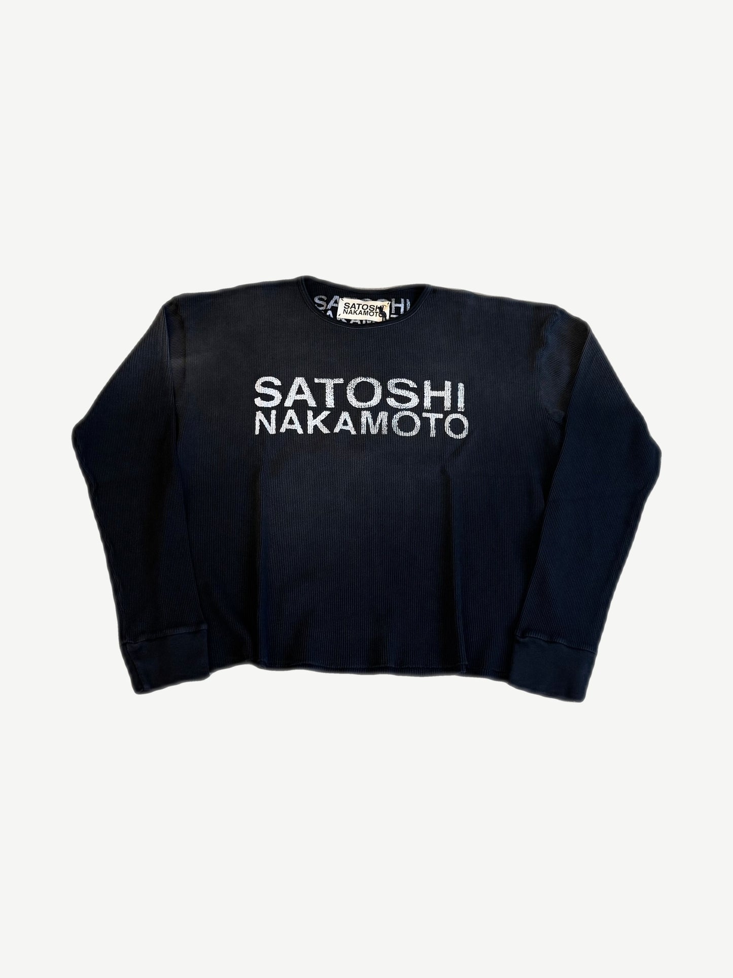 Satoshi Nakamoto black thermal waffle knit longsleeve front with white stacked Satoshi Nakamoto logo.