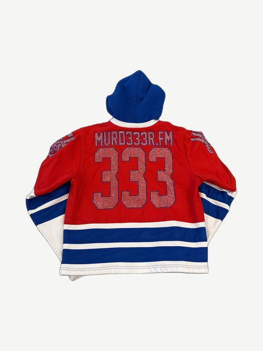 Murd333r FM Swamp Angels jersey hoodie back view with bold lettering and stripe trim on red sleeves.