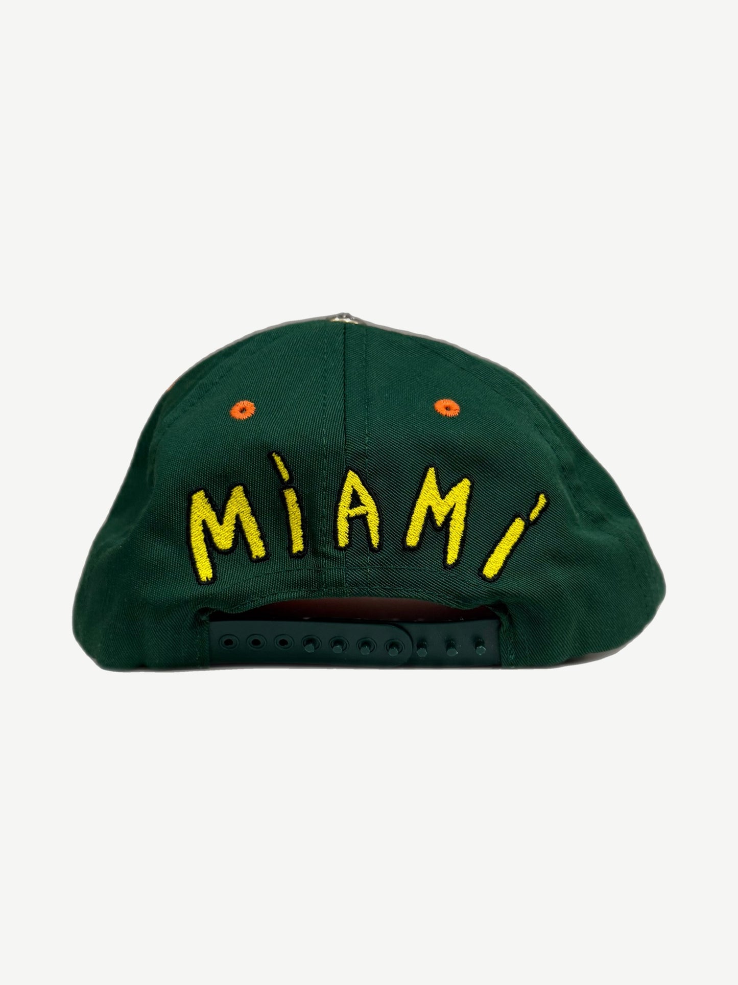 Chrome Hearts Miami baseball cap back, green panel with yellow MIAMI script and adjustable snapback closure.