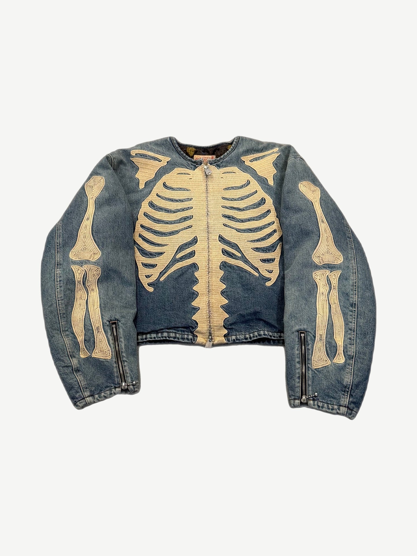 Kapital Bone Yard skeleton denim motocross jacket with cream ribcage embroidery on blue denim front