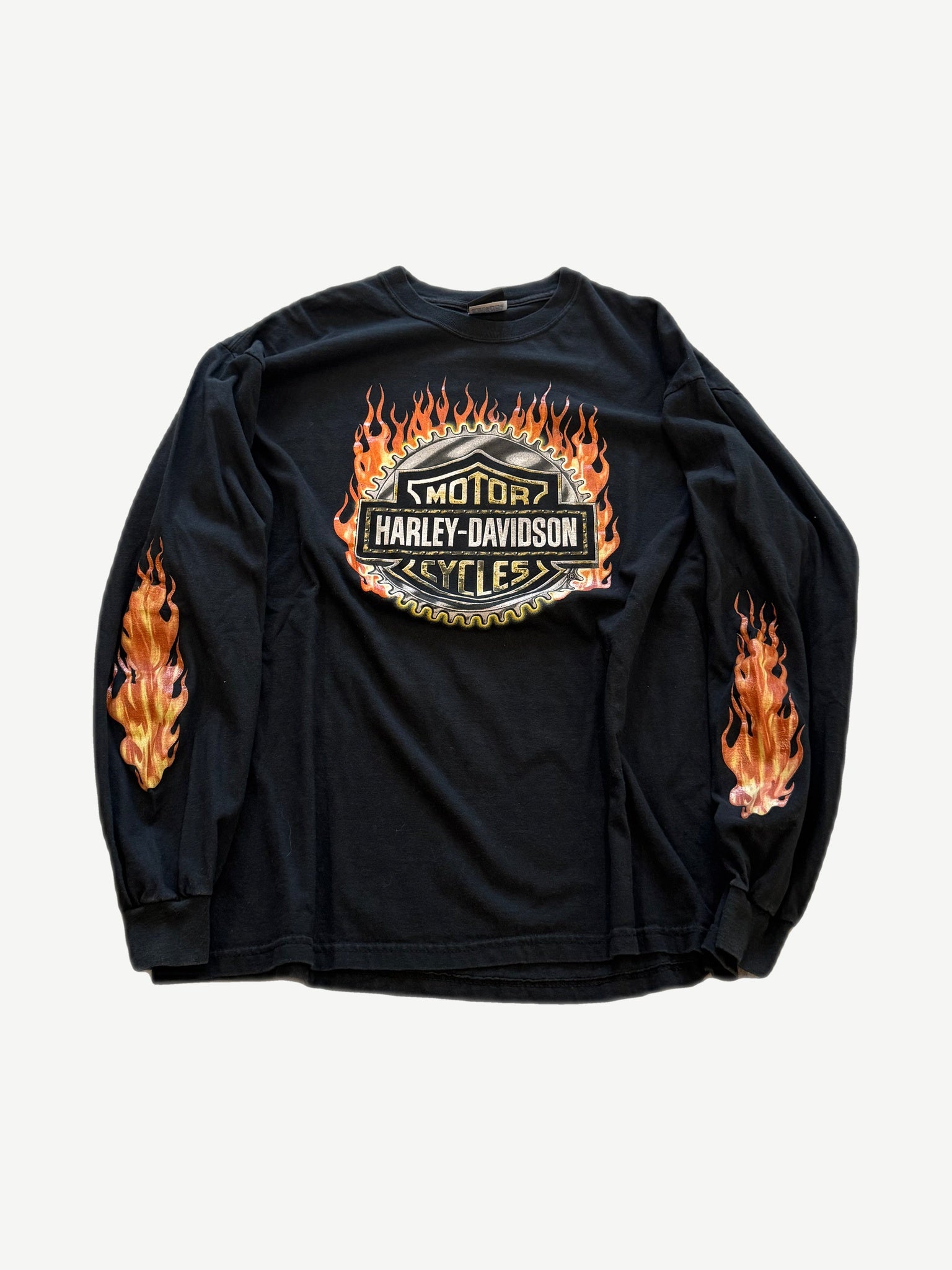 Vintage Harley Davidson longsleeve in black with chest motor logo and flame graphics on sleeves.