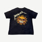 Vintage Metallica Pushead flaming skull tee back view with sun faded black cotton and ringer collar