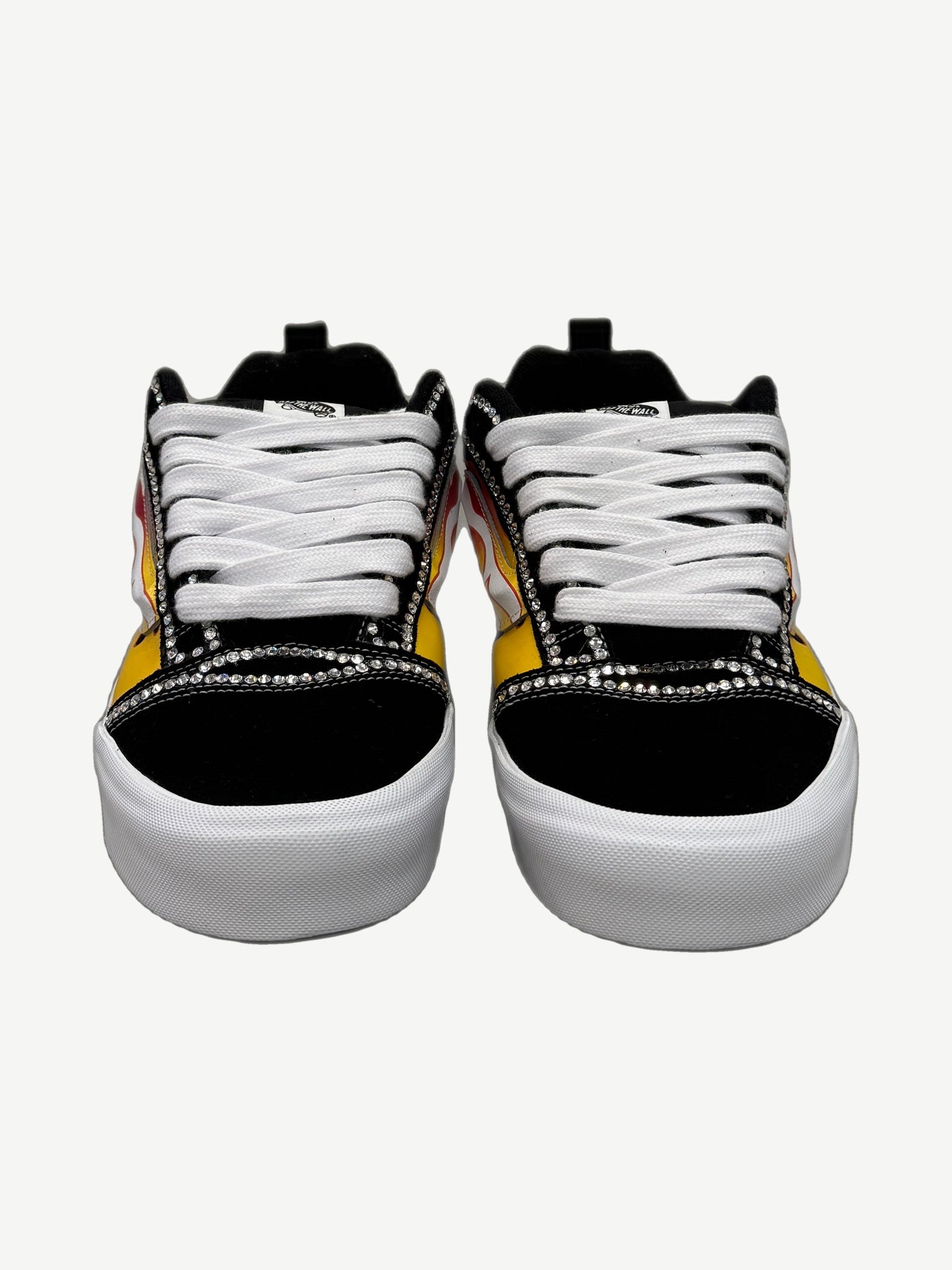 Custom Vans Knu Skool pair view showing rhinestone flame jazz stripe and white midsole detail