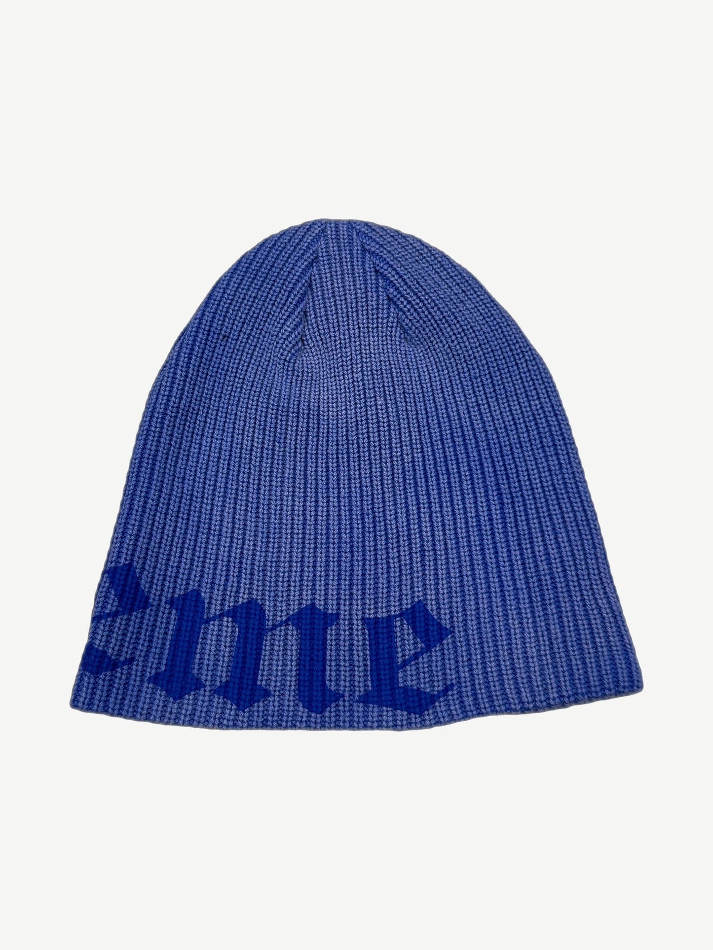 Supreme navy Old English printed beanie alternate angle showing folded cuff and woven brand logo tag