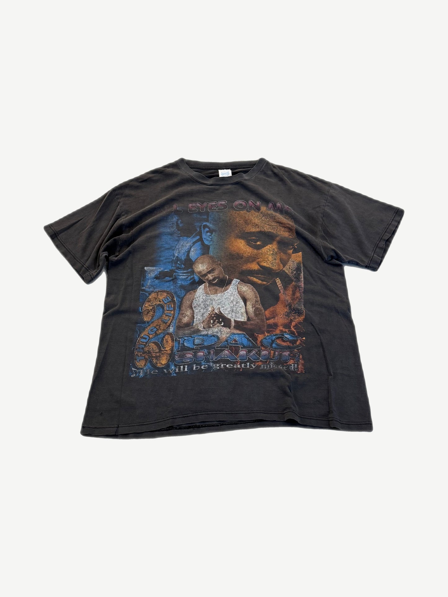 Vintage Tupac Shakur rap tee front view with All Eyes On Me portrait collage and Thug Life graphic