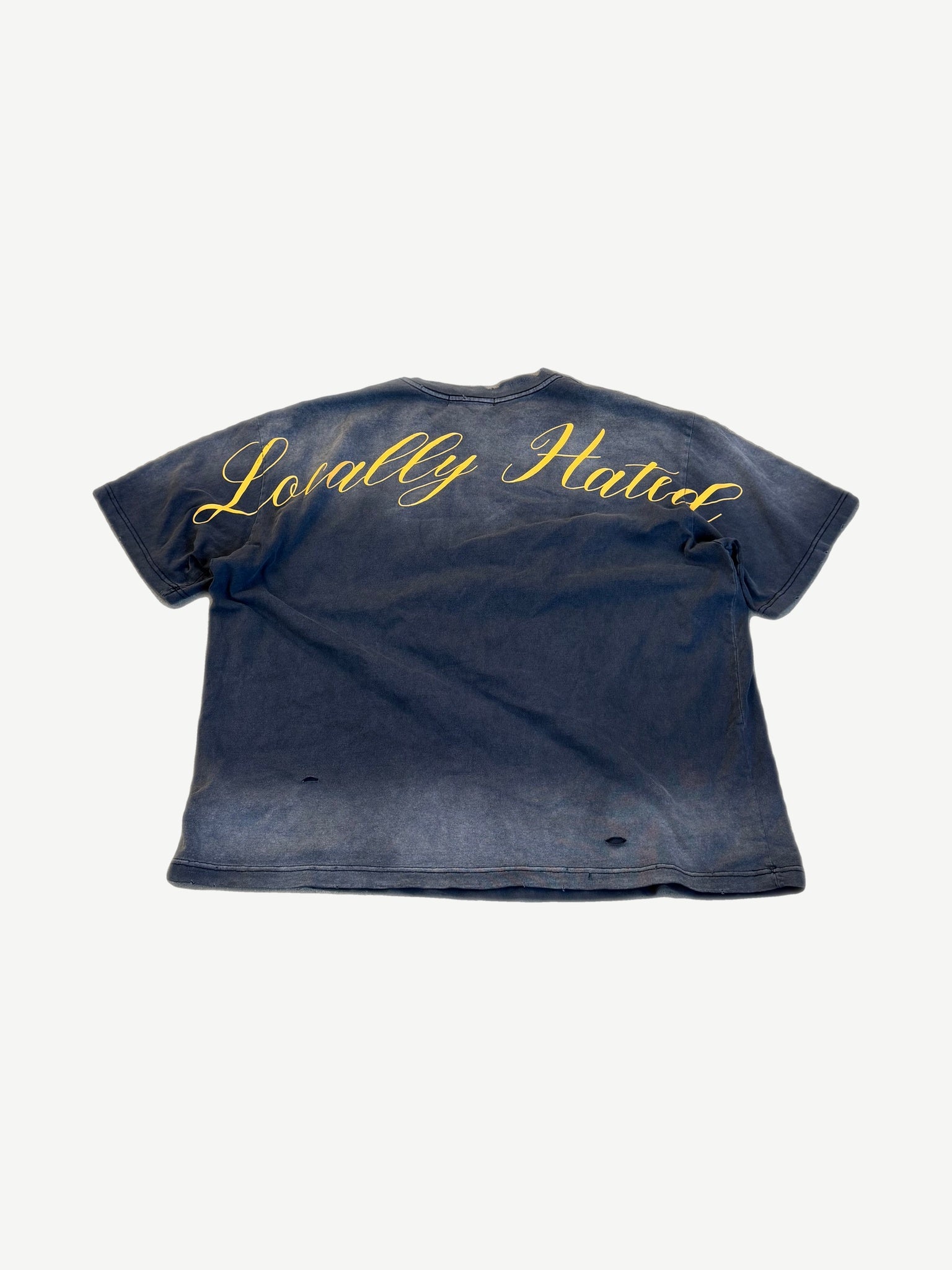 Back of Project GR washed navy tee with Locally Hated yellow cursive script print across shoulders