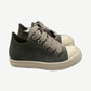 Rick Owens celadon green suede low sneakers side view with cream rubber cap toe and chunky jumbo laces