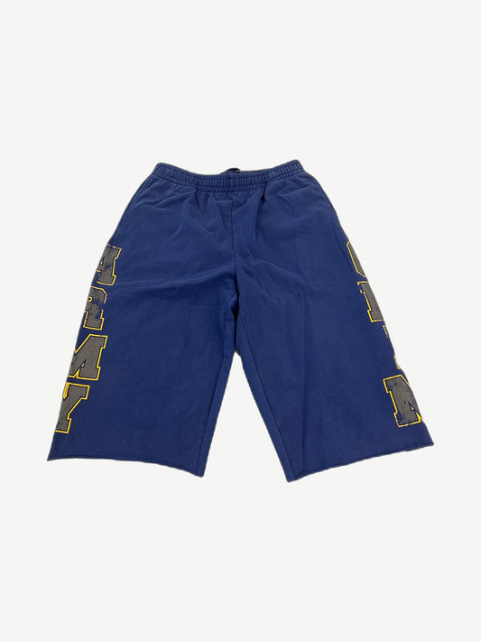 HMDD navy 3/4 sweat shorts with distressed gray and yellow varsity letters running down each leg.