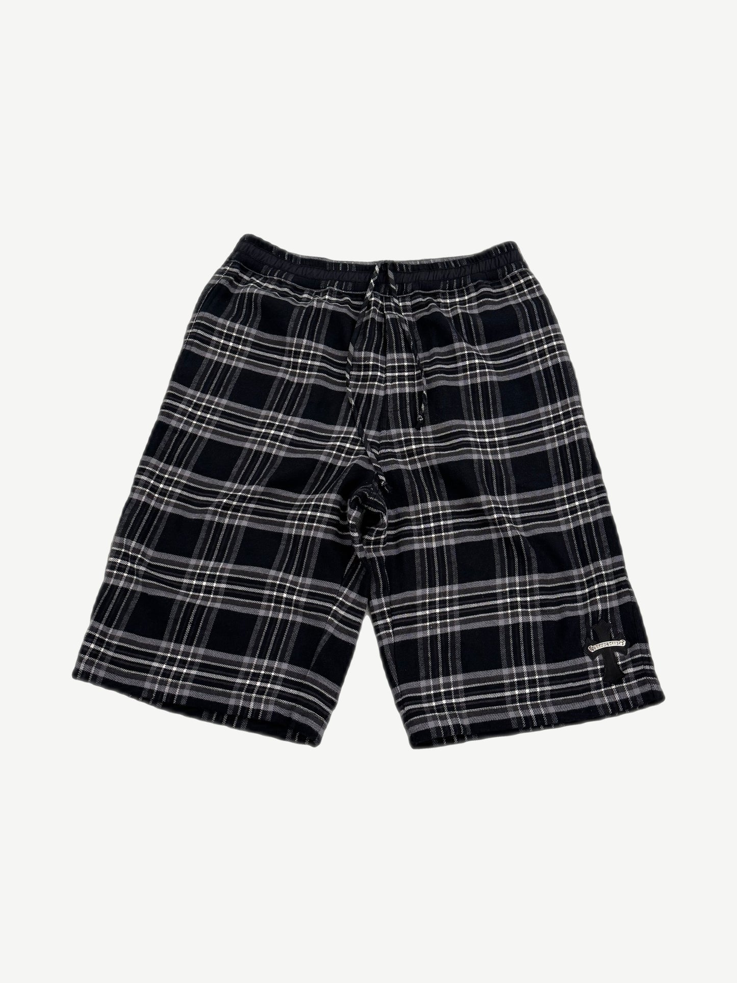 Chrome Hearts After School flannel shorts front, black and grey plaid with leather cross patch