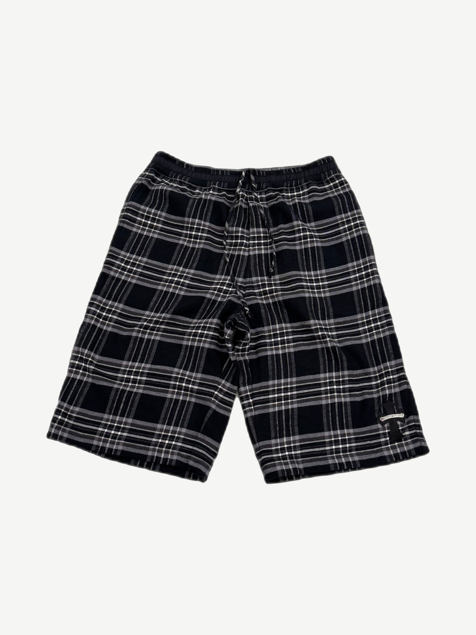 Chrome Hearts After School flannel shorts front, black and grey plaid with leather cross patch