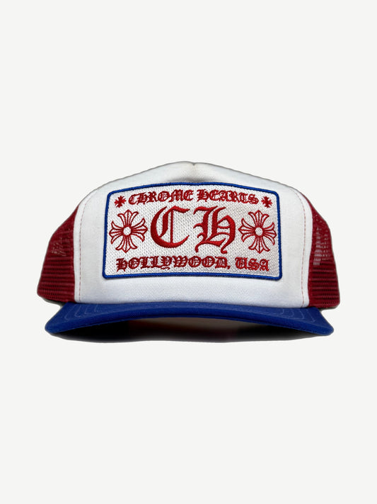 Chrome Hearts July 4th red white blue CH Hollywood trucker hat with stars-and-stripes front panel.