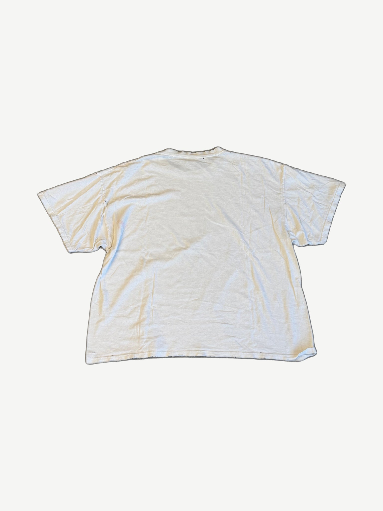 Vintage Tupac caricature white rap tee back view in plain distressed cotton with rolled hem