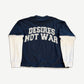 Bottega Desires navy long sleeve tee back, DESIRES NOT WAR white print with extended ribbed sleeve panels.