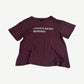 Enfants Riches Deprimes maroon cotton tee with white spray paint logo lettering printed across the chest.