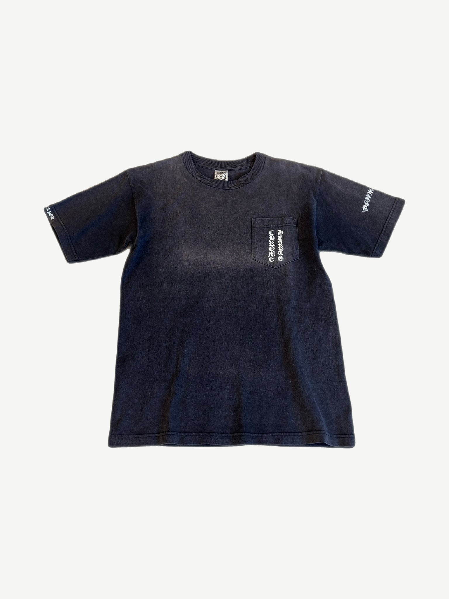 Chrome Hearts vintage faded navy pocket tee with vertical gothic Chrome Hearts pocket print and sleeves.