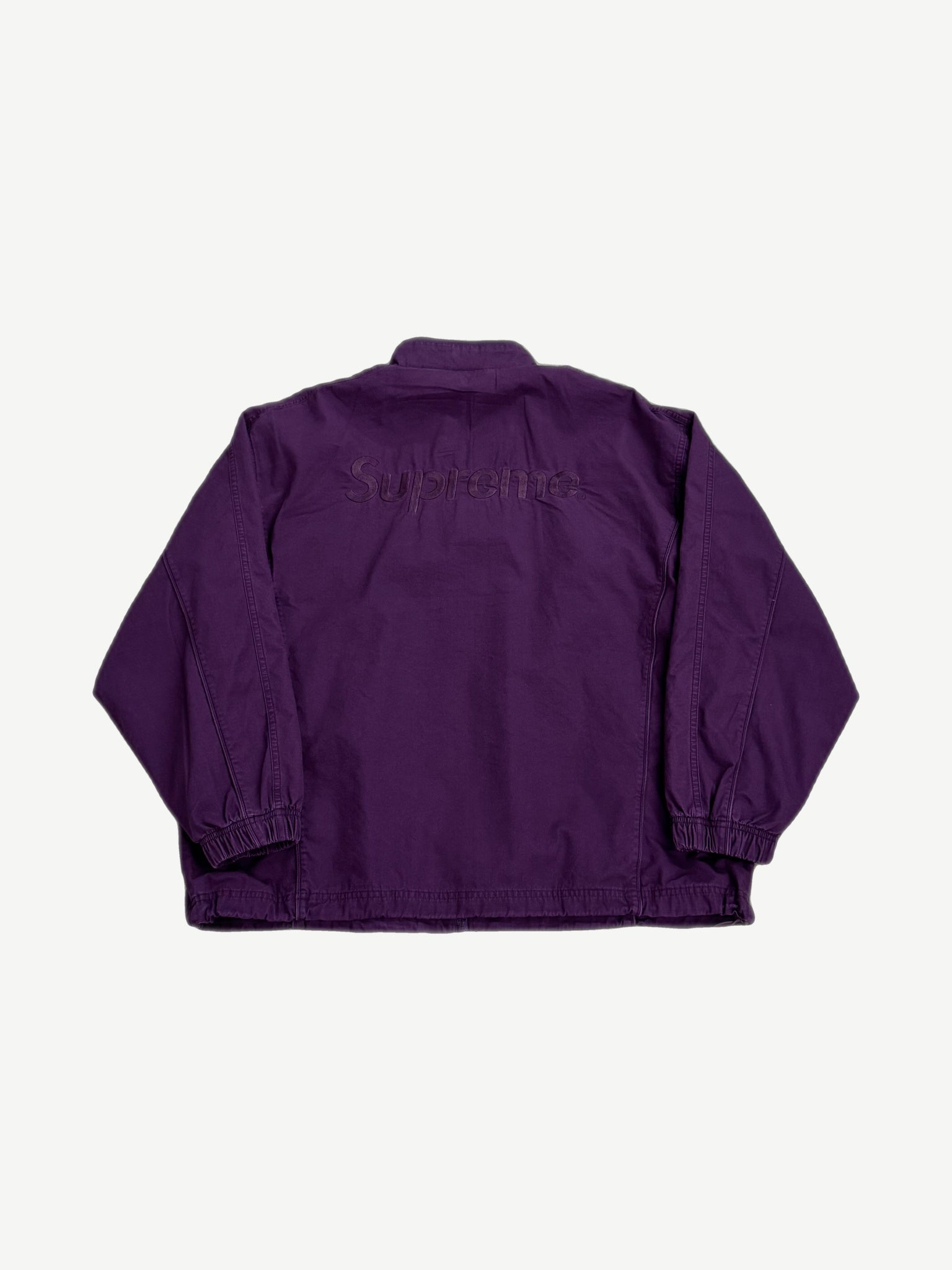 Supreme Umbro plum track jacket rear view with tonal embroidered Supreme box logo across upper back
