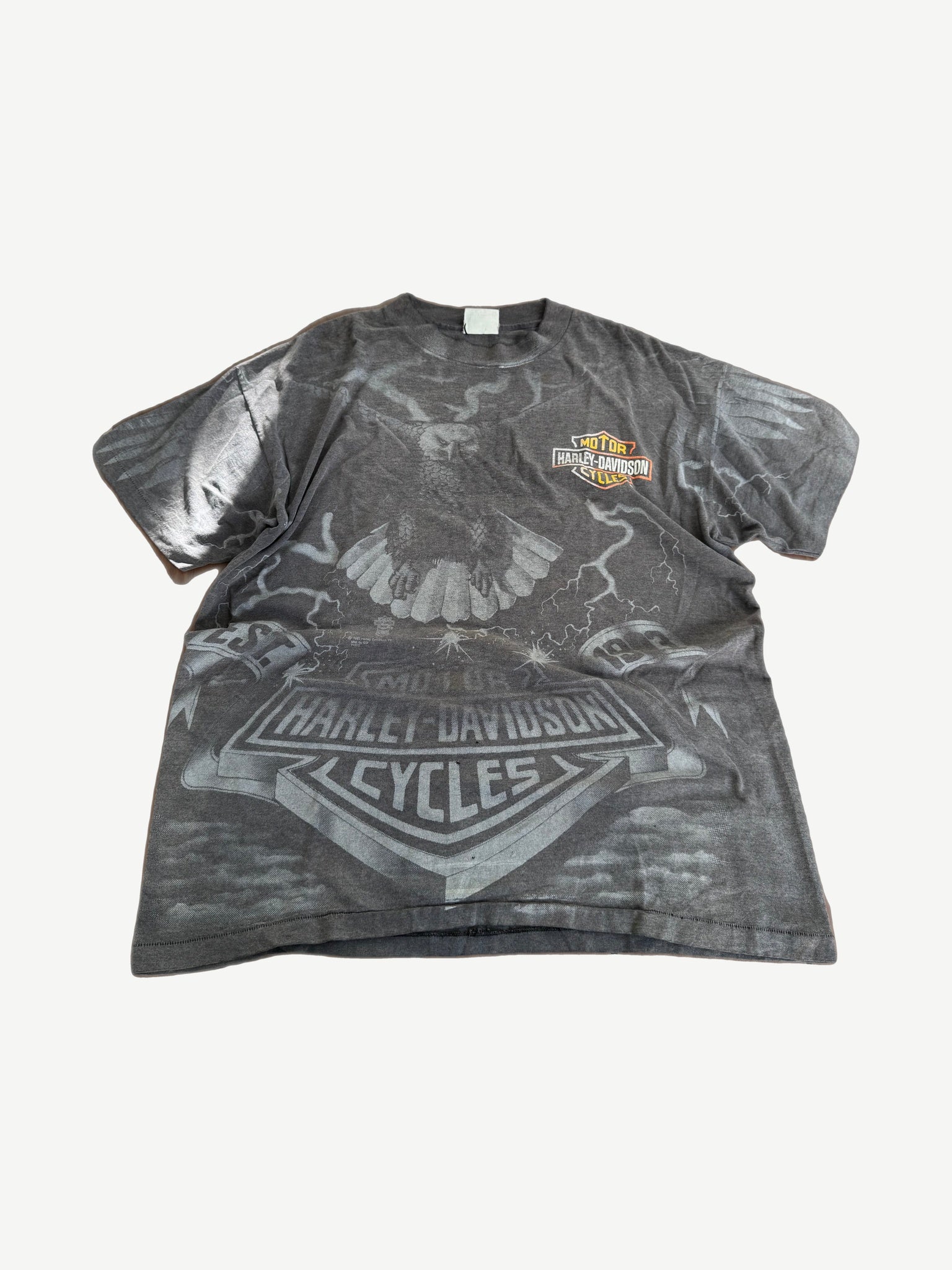 Vintage Harley Davidson tee with allover screaming eagle and orange bar-and-shield logo print