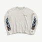 Chrome Hearts Matty Boy white waffle thermal longsleeve front with chest script and skull flame sleeves.