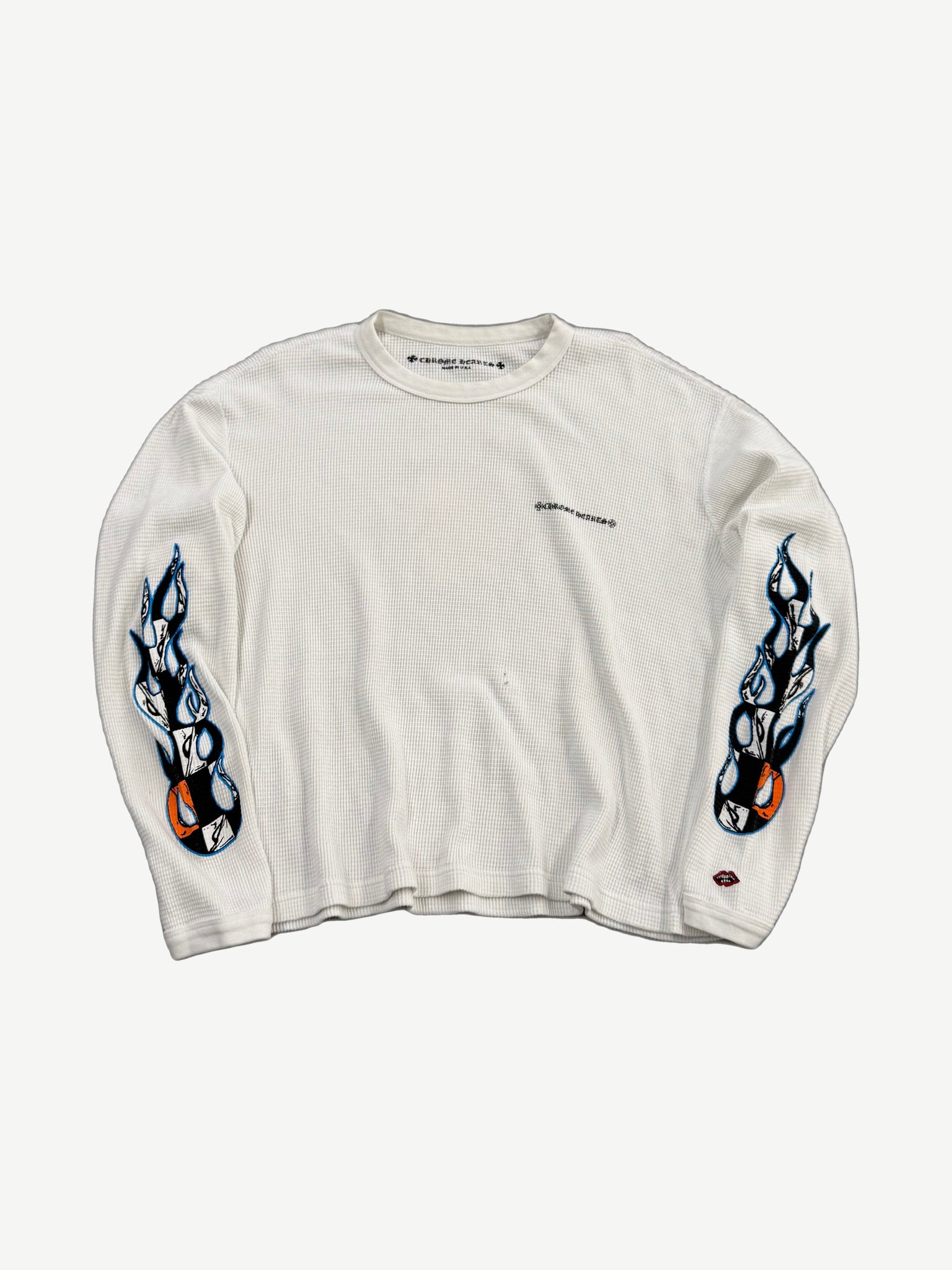 Chrome Hearts Matty Boy white waffle thermal longsleeve front with chest script and skull flame sleeves.