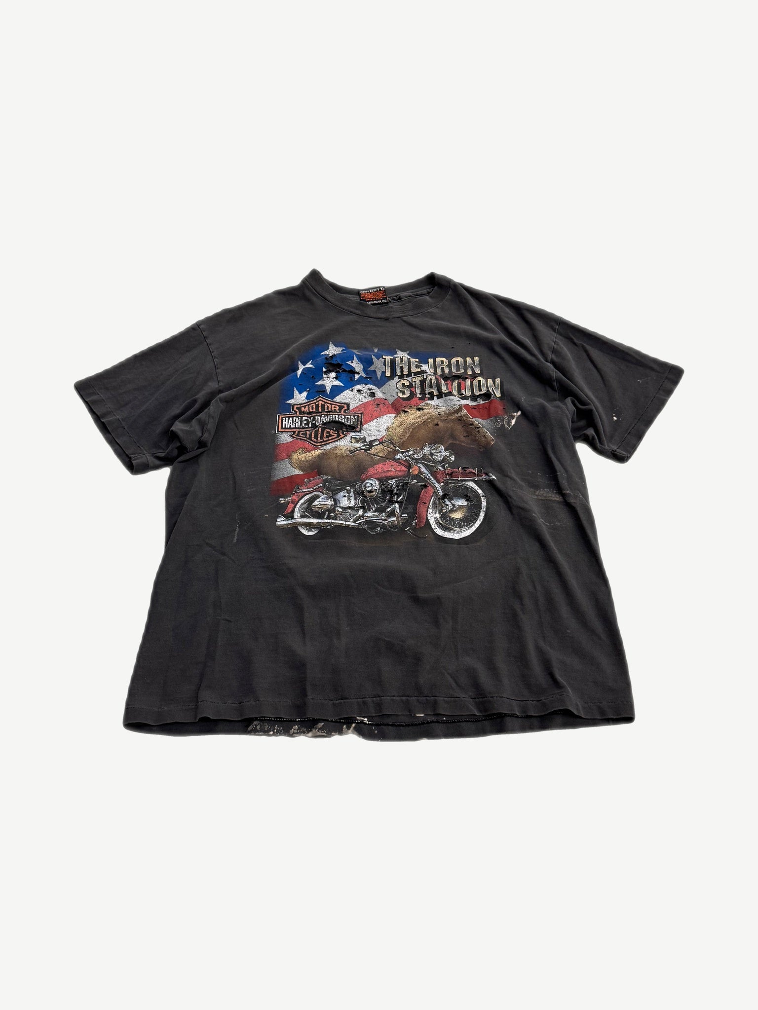 Vintage Harley Davidson Iron Stallion black tee with motorcycle graphic and bar shield logo.
