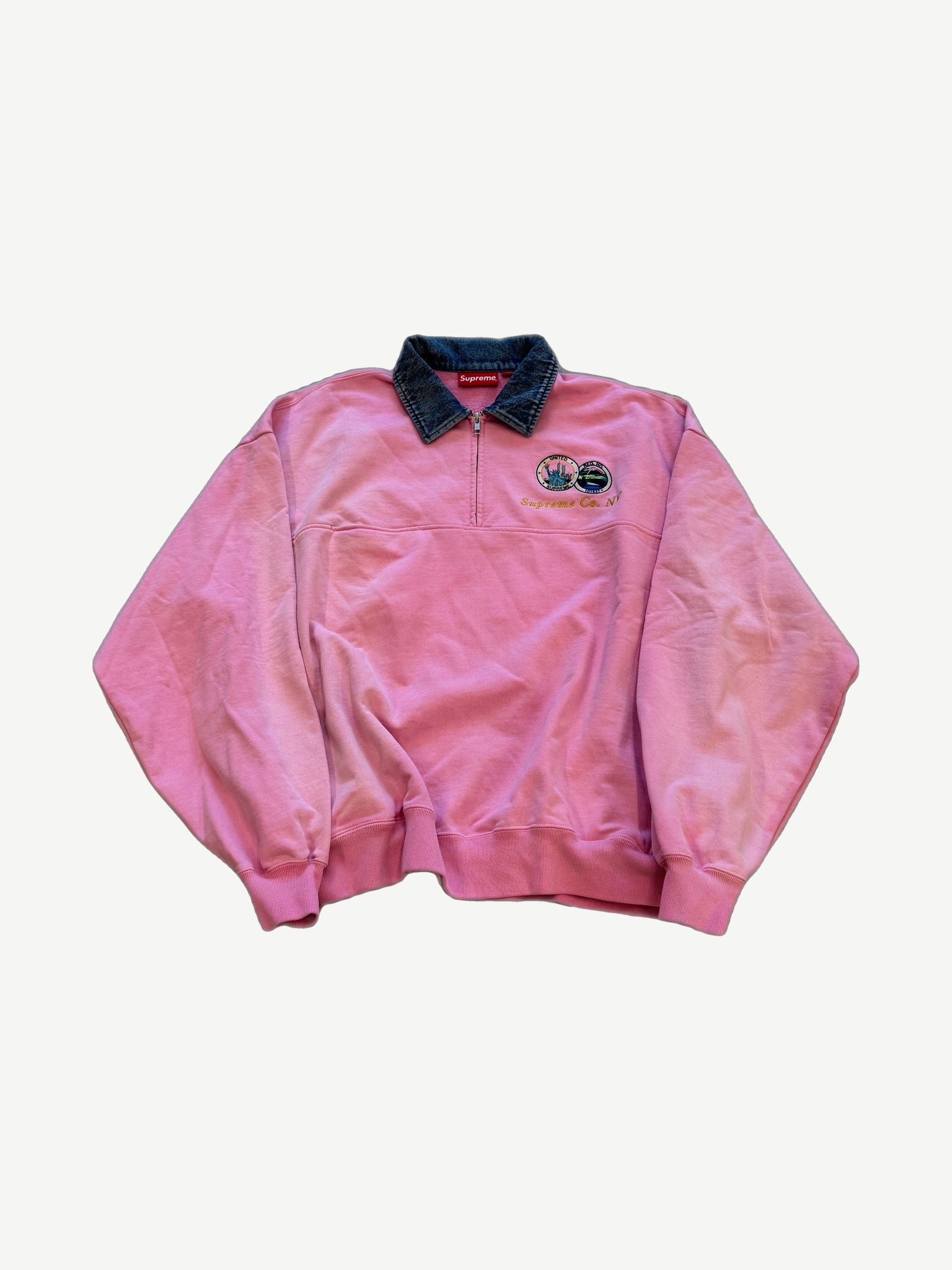 Supreme pink fleece half zip sweatshirt with contrasting denim collar and embroidered chest box logo.