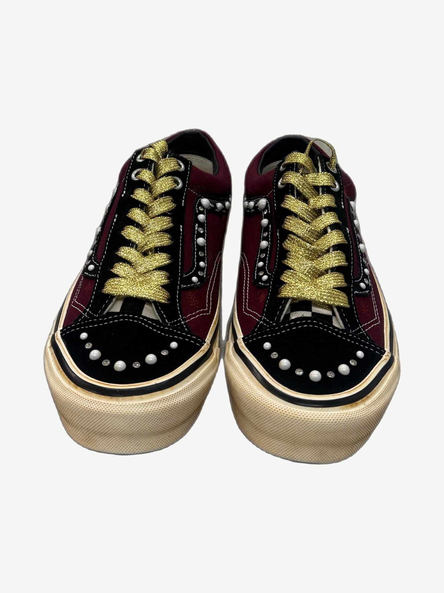 Heel and tongue detail of Satoshi Nakamoto x Vans Old Skool 36 with collaboration branding on padded collar.