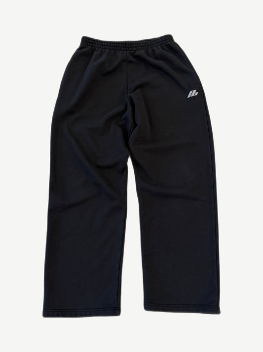 Balenciaga 3M logo sweatpants in black with reflective silver Balenciaga wordmark on left thigh.