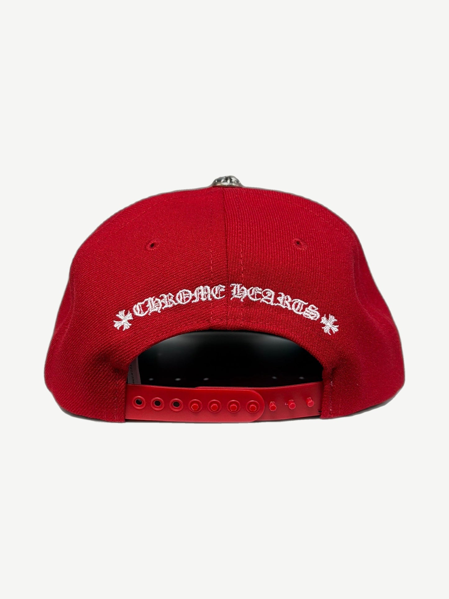 Chrome Hearts red baseball hat back view with white Chrome Hearts cross script and adjustable snapback strap