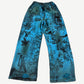 Balenciaga blue graffiti skater sweatpants back view showing wide loose fit and tagged jersey fabric.
