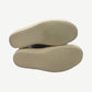 Sole view of Rick Owens Hollywood low sneakers showing cream ridged rubber outsole with Rick Owens signature