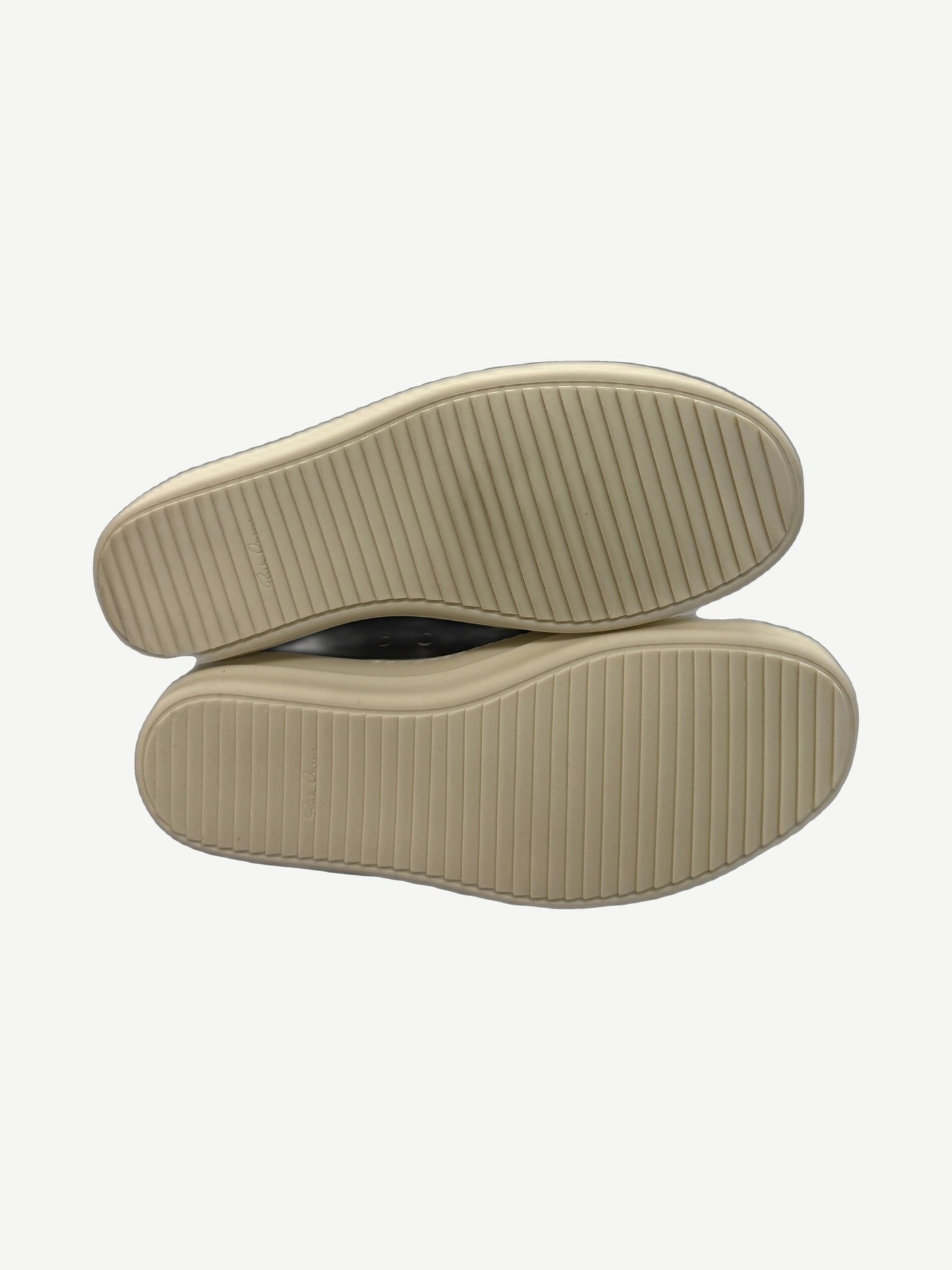 Sole view of Rick Owens Hollywood low sneakers showing cream ridged rubber outsole with Rick Owens signature