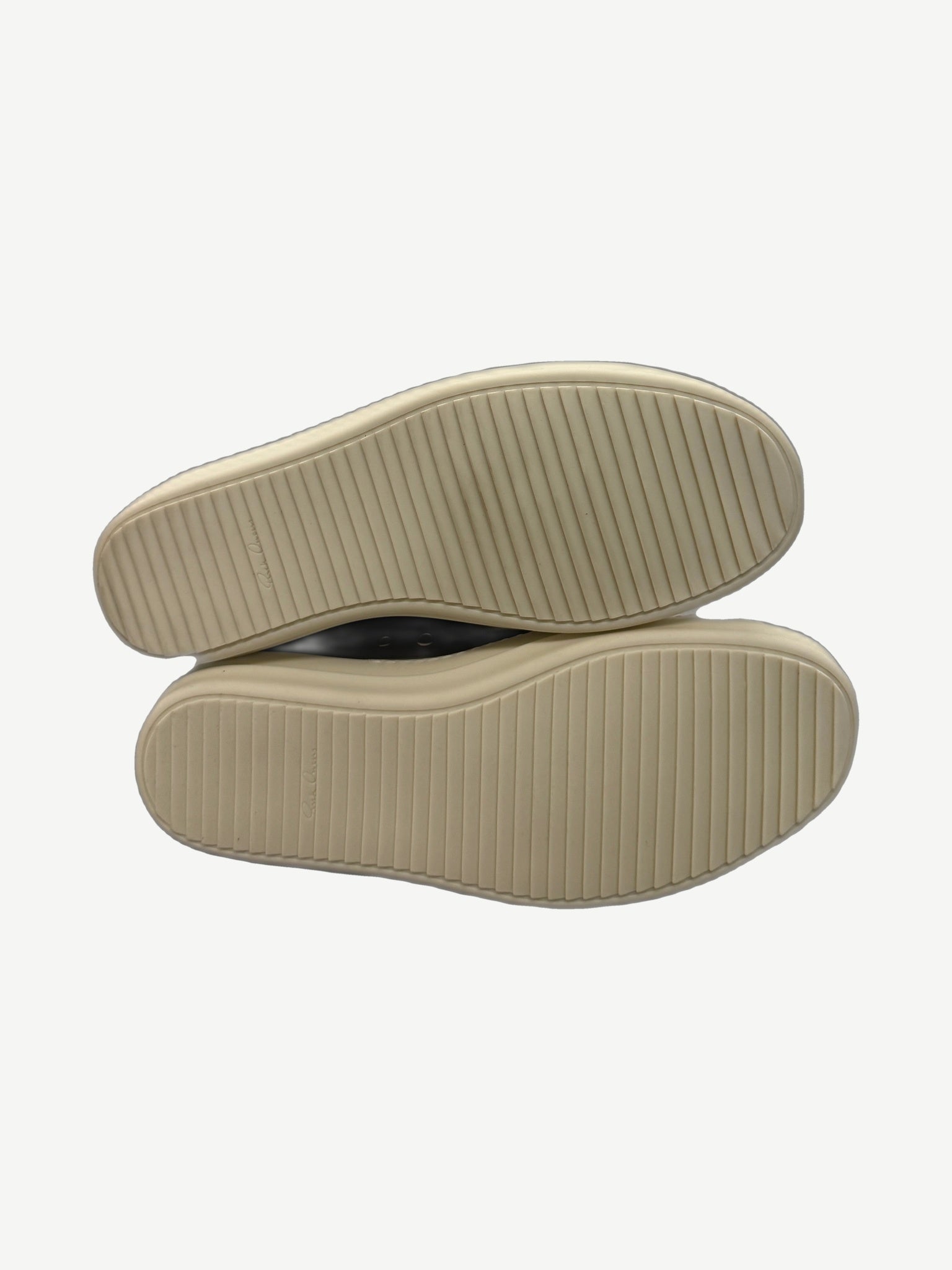 Sole view of Rick Owens Hollywood low sneakers showing cream ridged rubber outsole with Rick Owens signature