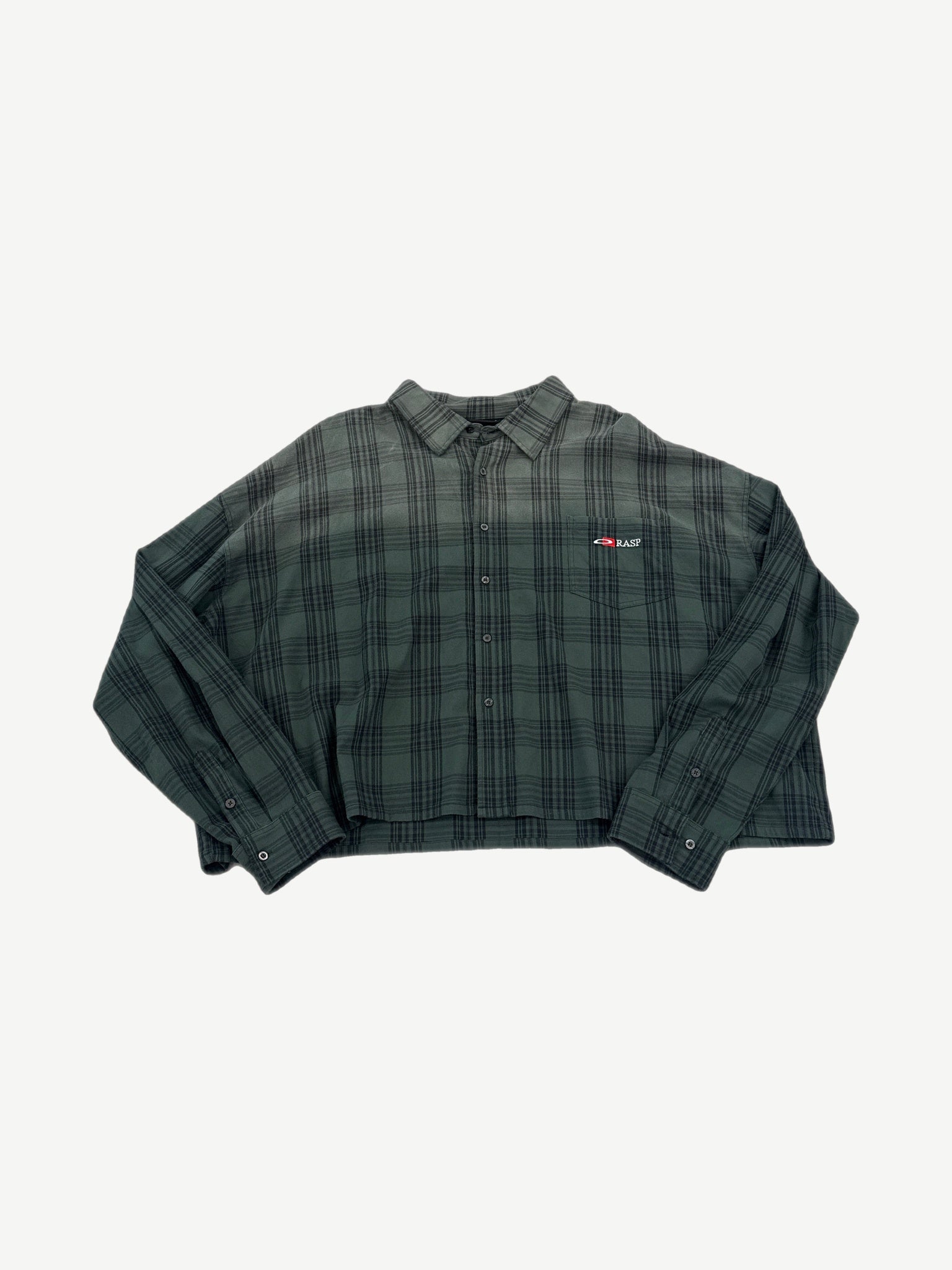 Raspberry Hills green and black plaid cropped flannel with embroidered Rasp logo patch on chest pocket.