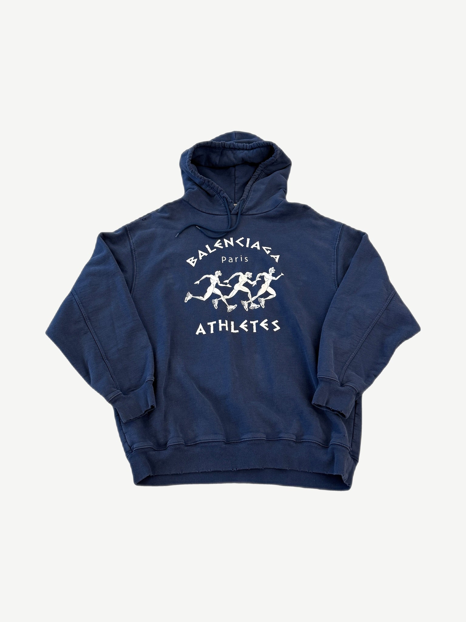 Balenciaga washed navy Marathon hoodie front with small embroidered logo and oversized boxy silhouette.