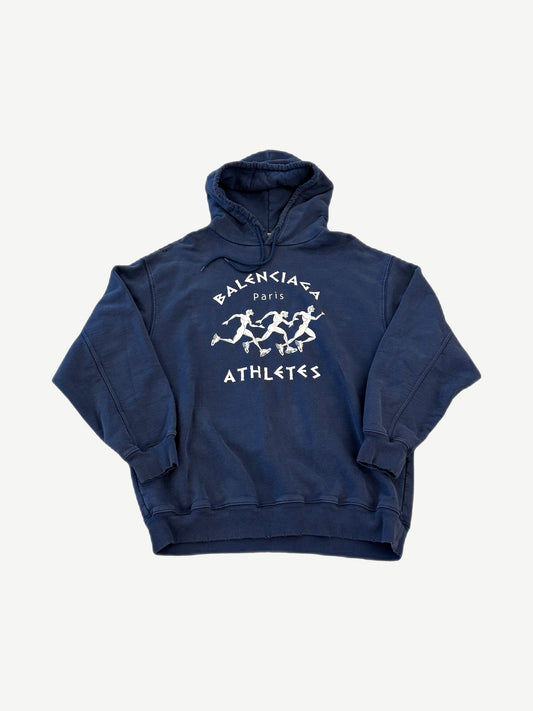 Balenciaga washed navy Marathon hoodie front with small embroidered logo and oversized boxy silhouette.