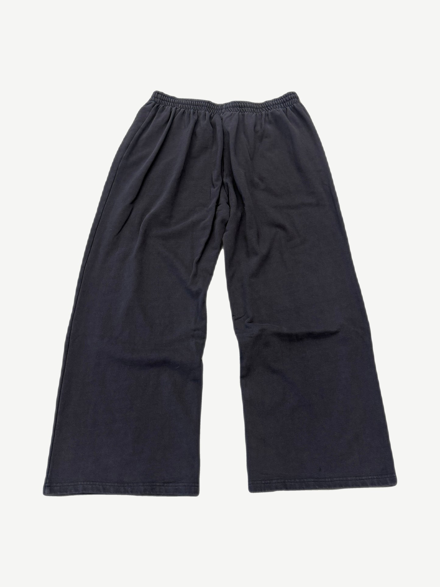 GV Gallery Raspberry Hills black sweatpants back view, baggy fit with drawstring waist and tapered cuffs.
