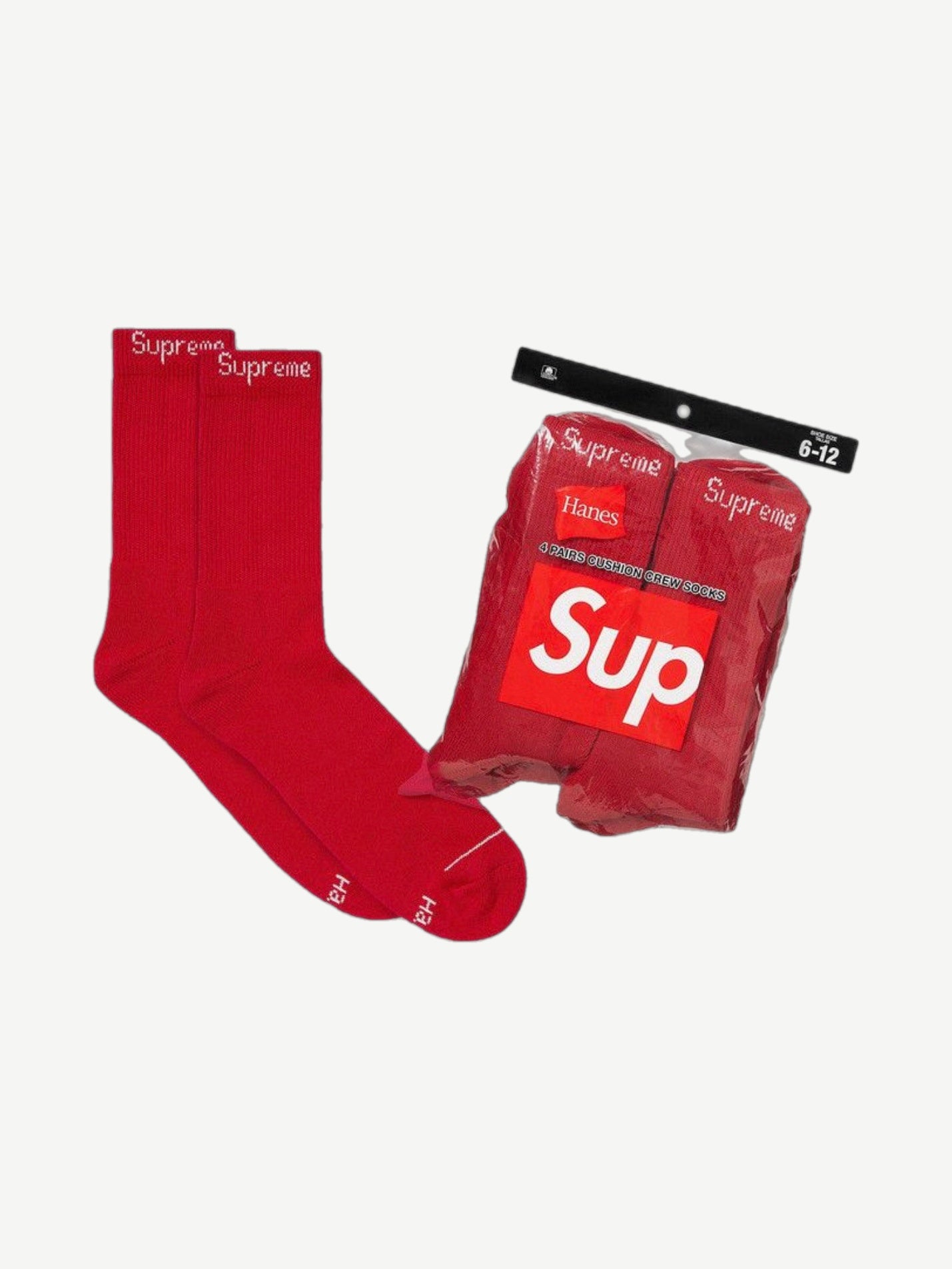 Supreme red four pack crew socks in sealed packaging, white box logo across cuff bands