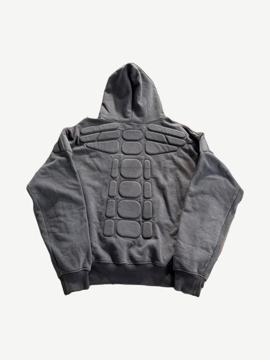 Satoshi Nakamoto Moto hoodie back view with seamed paneling and faded distressed cotton fleece.