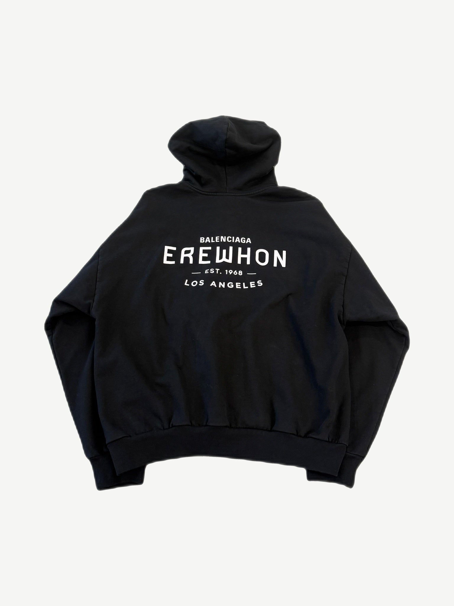 Balenciaga Erewhon black zip-up hoodie back view showing oversized cut and clean back panel.