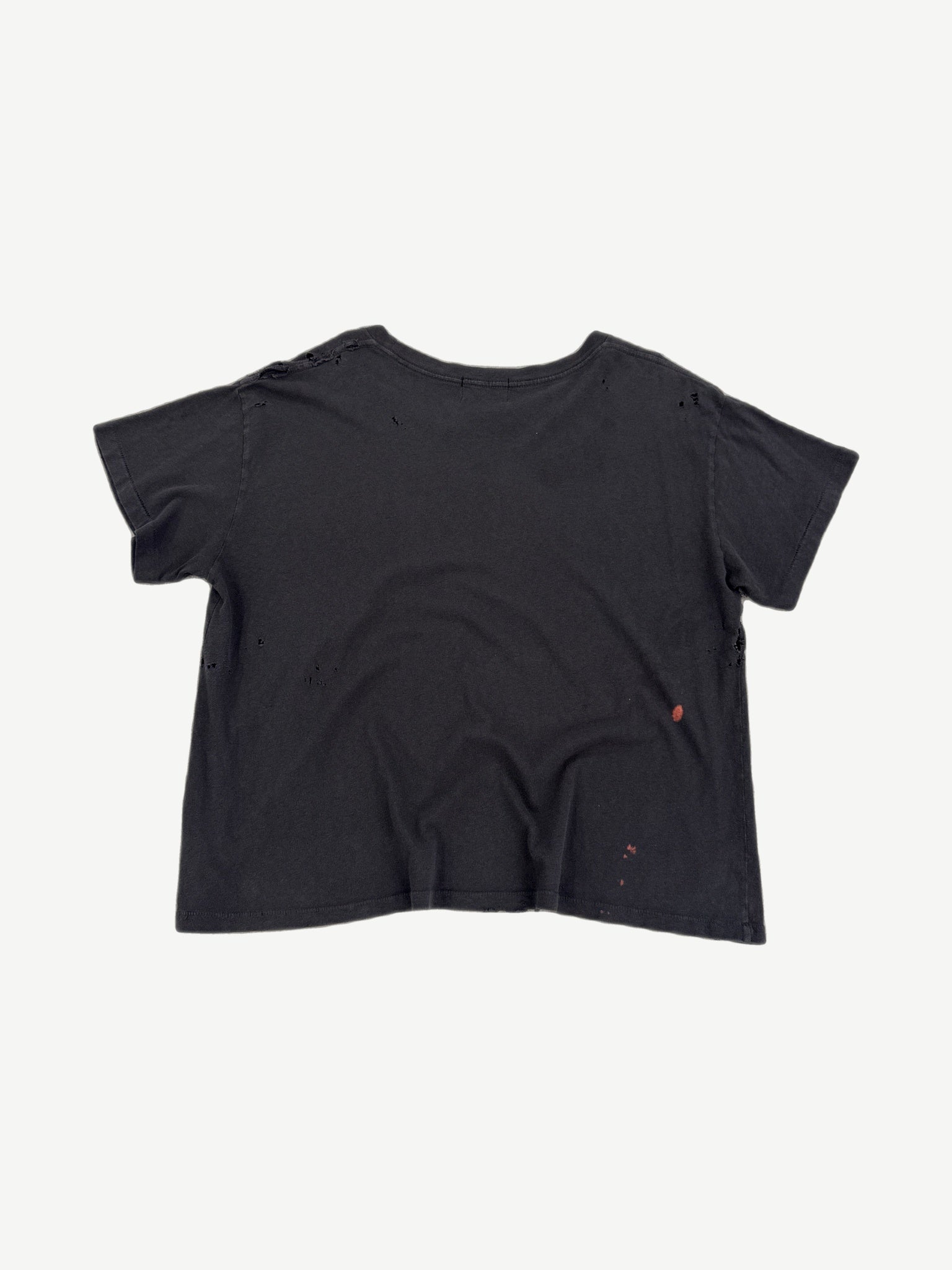 Enfants Riches Deprimes black distressed tee back view with worn holes and faded cotton jersey