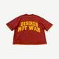 Bottega Desires red tee back with yellow arched Desires Not War varsity slogan graphic