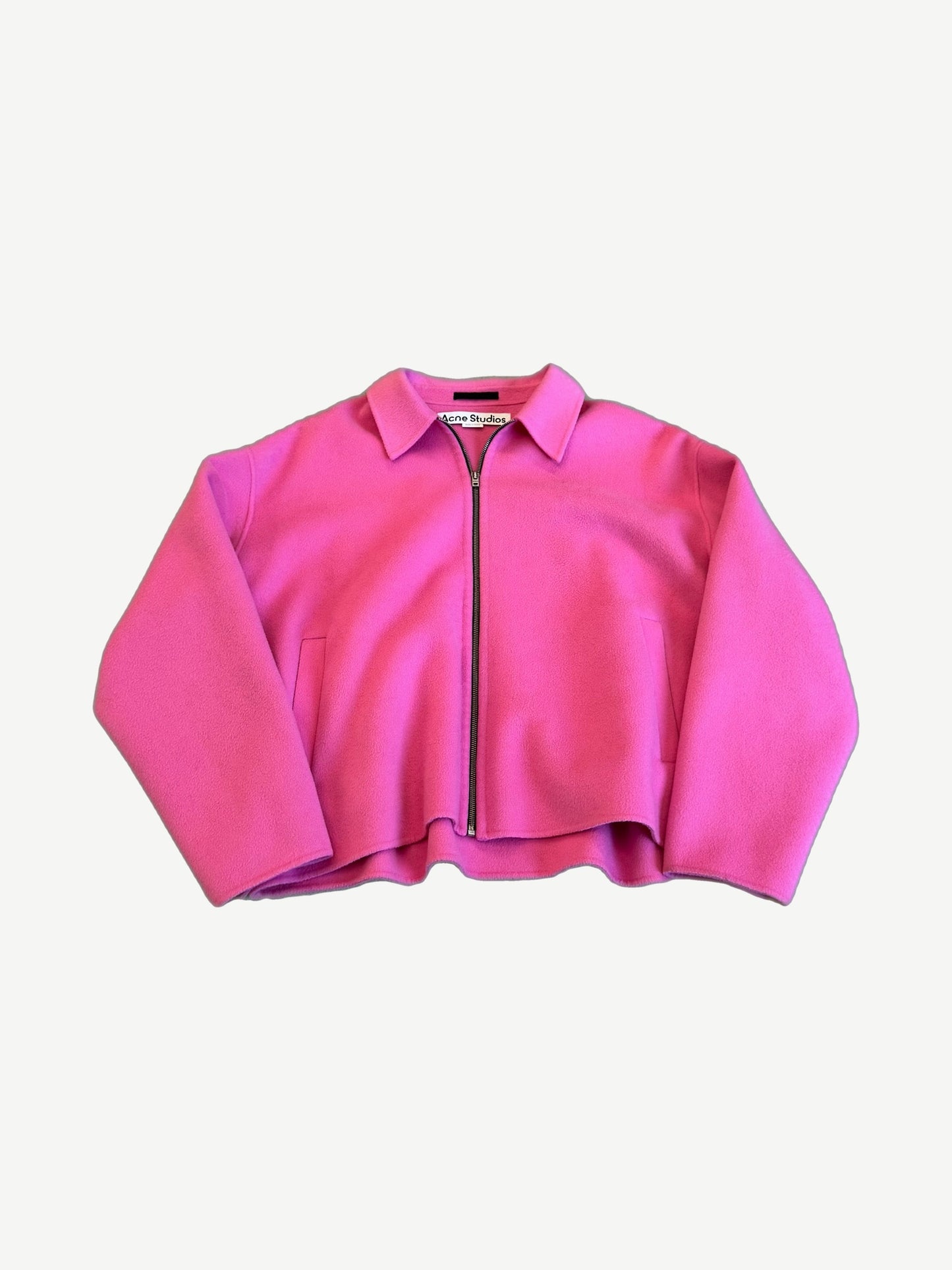 Acne Studios Doverio cropped wool zip jacket in bubblegum pink with collar, drop shoulders and pink Acne label