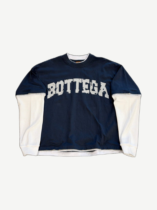 Bottega Desires navy long sleeve crewneck front, distressed white BOTTEGA arch print and ribbed contrast cuffs.