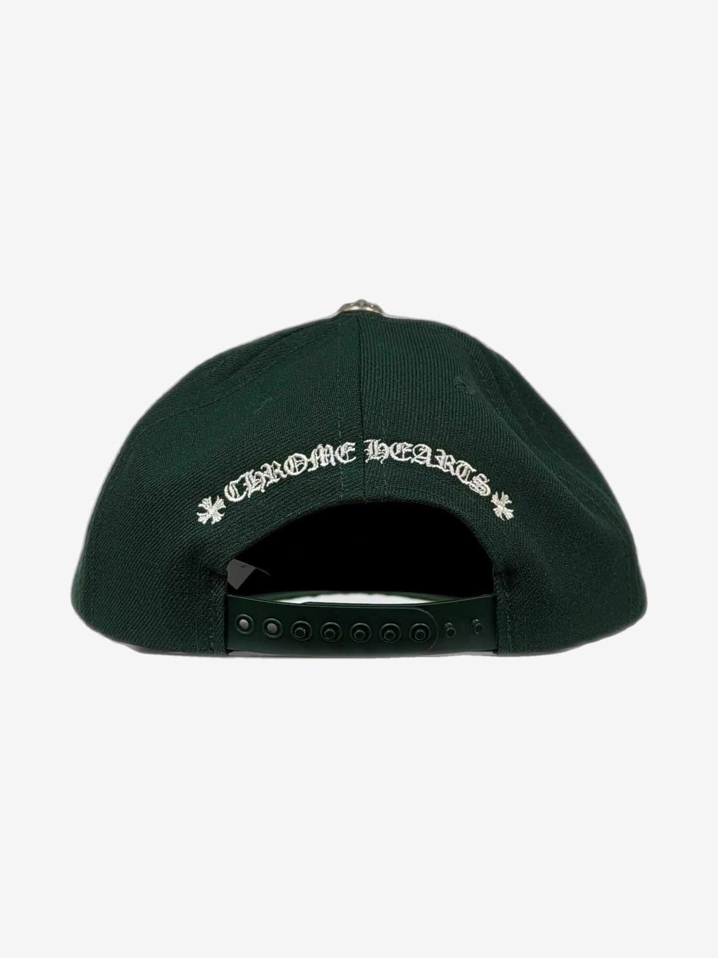 Chrome Hearts green cotton dad hat, top angle view of curved brim and white stitched CH logo