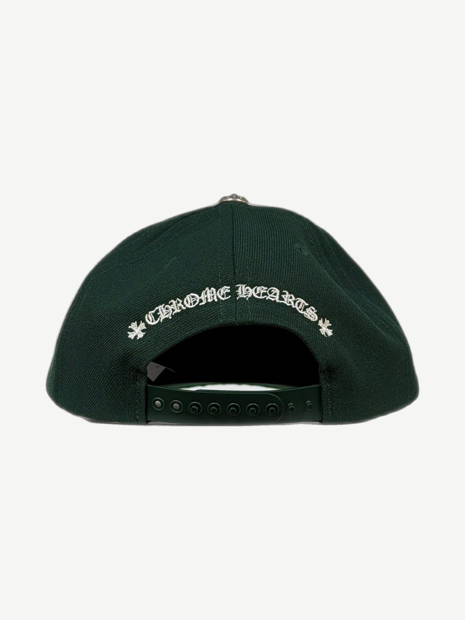 Chrome Hearts green cotton dad hat, top angle view of curved brim and white stitched CH logo
