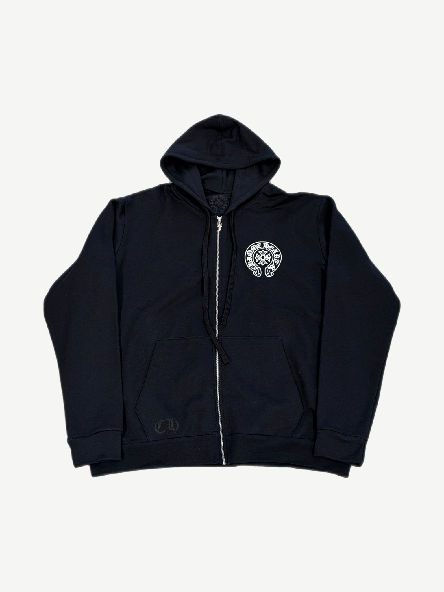 Chrome Hearts black zip up hoodie front with white horseshoe logo at chest and gothic CH pocket print